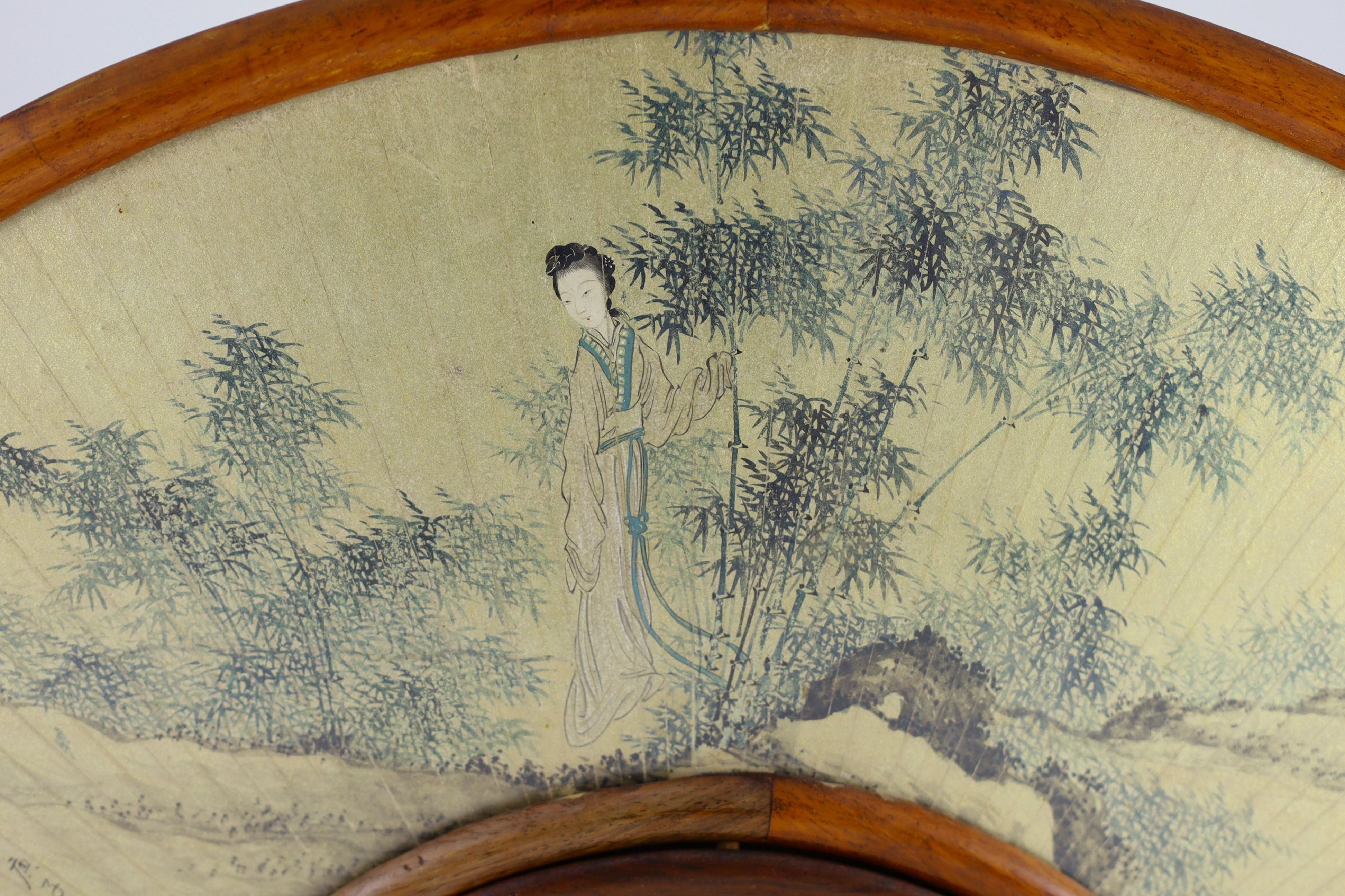 A Chinese painted and inscribed gilt paper fan leaf, 19th century, Total width 56 cm, minor damage